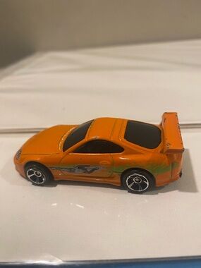 Supra Orange Racing Die-Cast Toy Car with Graphics